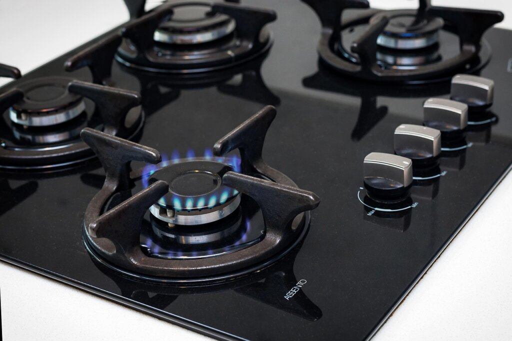 sparkling clean kitchen stove and hood after degreasing