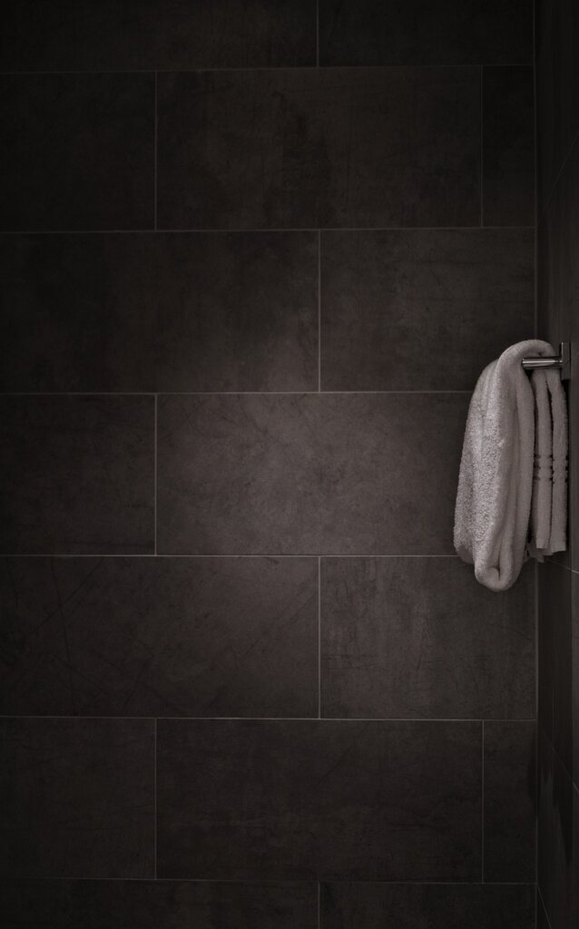 towel hanging on bathroom rail vs towel spread on outdoor drying rack