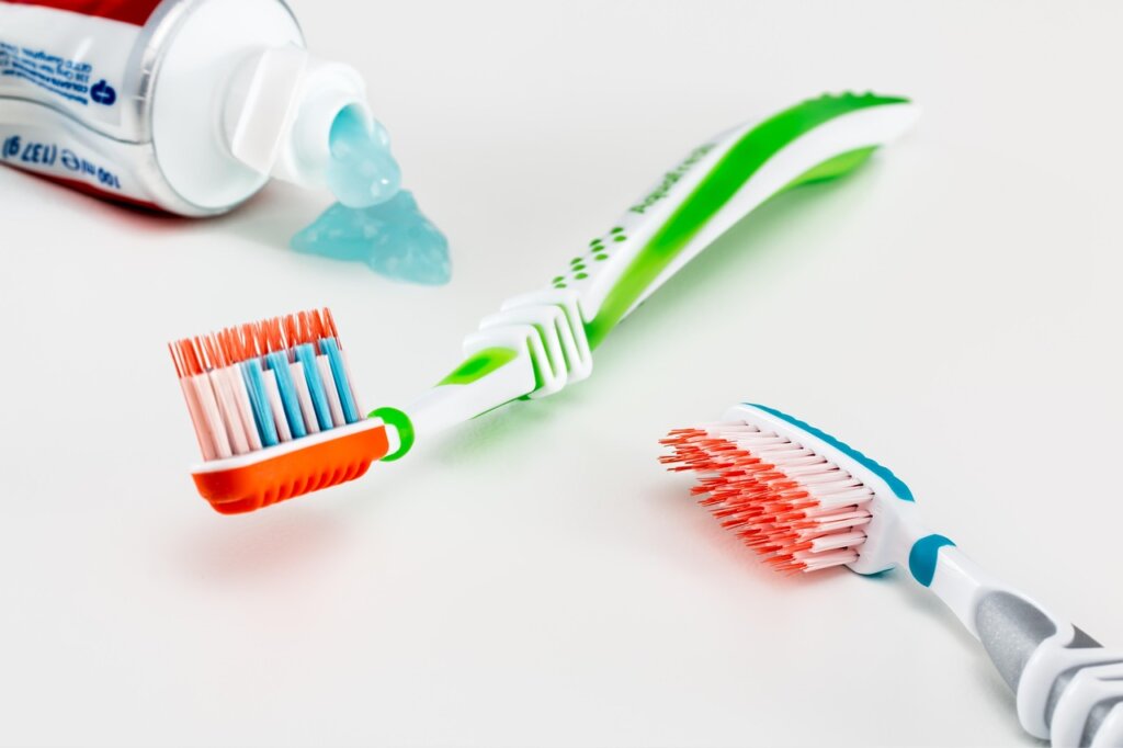 bathroom drain cleaning tools laid out on white surface
