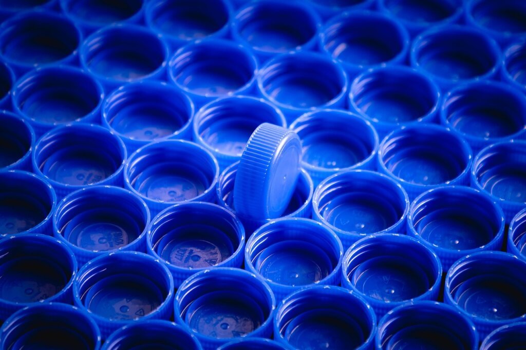 close-up of plastic recycling symbol on container bottom showing number 5 PP