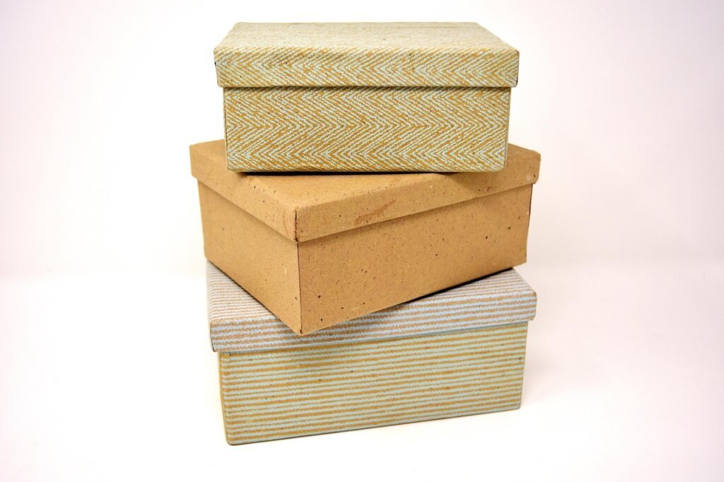 cardboard box cut into drawer divider organizer